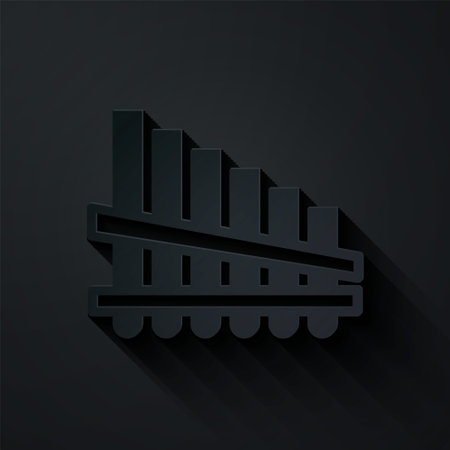 Paper cut Pan flute icon isolated on black background. Traditional peruvian musical instrument. Zampona. Folk instrument from Peru, Bolivia and Mexico. Paper art style. Vectorのイラスト素材