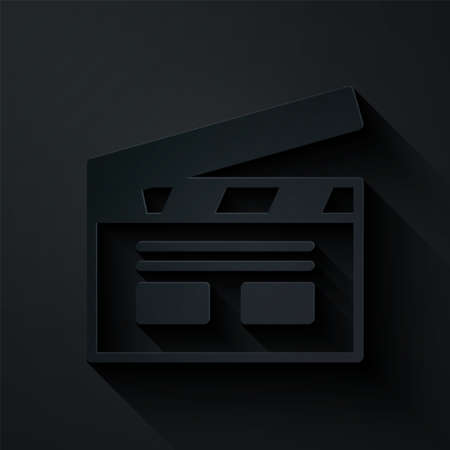 Paper cut Cinema icon isolated on black background. Movie clapper. Film clapper board. Cinema production or media industry. Paper art style. Vectorのイラスト素材