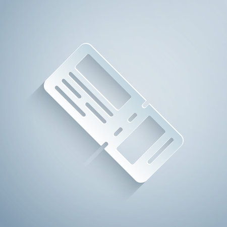 Paper cut Airline ticket icon isolated on grey background. Plane ticket. Paper art style. Vectorのイラスト素材