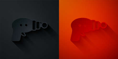 Paper cut Ray gun icon isolated on black and red background. Laser weapon. Space blaster. Paper art style. Vectorのイラスト素材