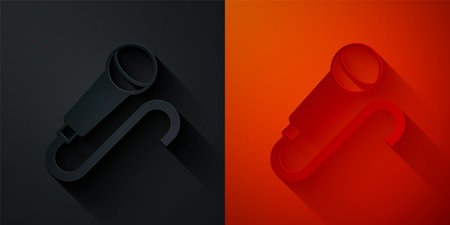 Paper cut Microphone icon isolated on black and red background. On air radio mic microphone. Speaker sign. Paper art style. Vectorのイラスト素材