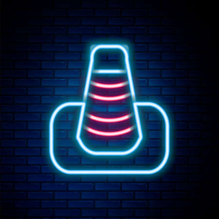 Glowing neon line Traffic cone icon isolated on brick wall background. Colorful outline concept. Vectorのイラスト素材