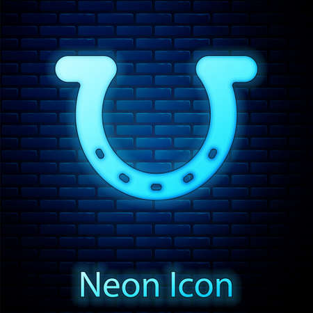 Glowing neon Horseshoe icon isolated on brick wall background. Vectorのイラスト素材