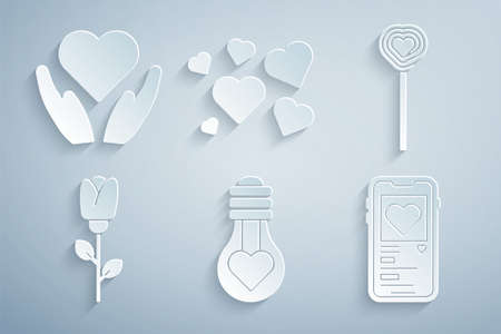 Set Heart shape in light bulb, Lollipop, Flower rose, Mobile with heart, and hand icon. Vectorのイラスト素材