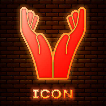 Glowing neon Hands in praying position icon isolated on brick wall background. Prayer to god with faith and hope. Vector Illustrationのイラスト素材