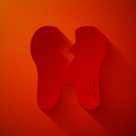 Paper cut Broken tooth icon isolated on red background. Dental problem icon. Dental care symbol. Paper art style. Vectorのイラスト素材