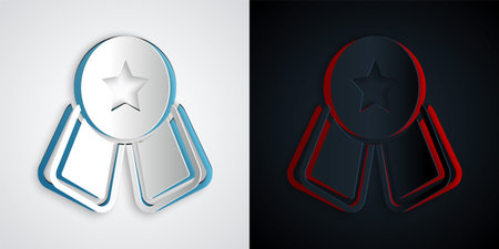 Paper cut Medal with star icon isolated on grey and black background. Winner symbol. Paper art style. Vectorのイラスト素材
