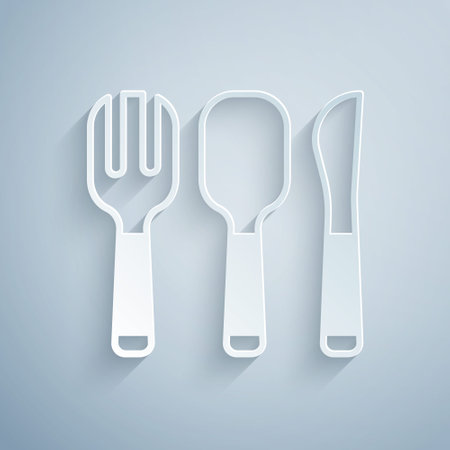 Paper cut Fork, spoon and knife icon isolated on grey background. Cooking utensil. Cutlery sign. Paper art style. Vectorのイラスト素材