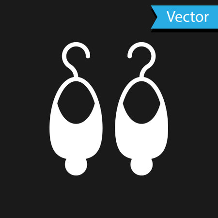White Earrings icon isolated on black background. Jewelry accessories. Vectorのイラスト素材