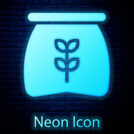 Glowing neon Bag of flour icon isolated on brick wall background. Vectorのイラスト素材