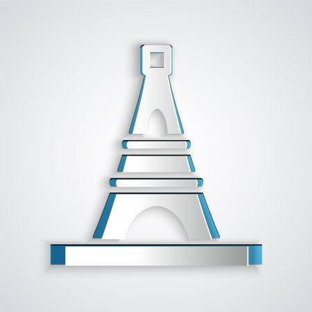 Paper cut Eiffel tower icon isolated on grey background. France Paris landmark symbol. Paper art style. Vectorのイラスト素材