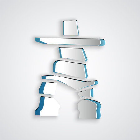 Paper cut Inukshuk icon isolated on grey background. Paper art style. Vectorのイラスト素材