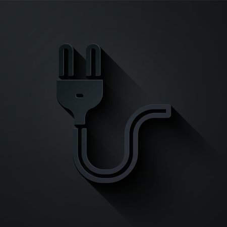 Paper cut Electric plug icon isolated on black background. Concept of connection and disconnection of the electricity. Paper art style. Vector.のイラスト素材