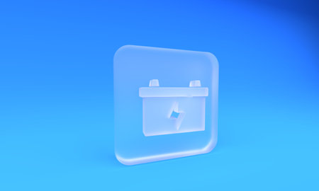 Frosted glass Car battery icon isolated on blue background. Accumulator battery energy power and...