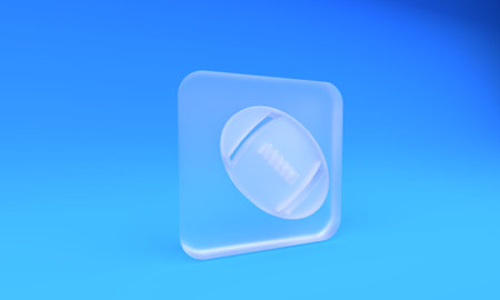 Frosted glass American Football ball icon isolated on blue background. Rugby ball icon. Team sport game symbol. Square frosted glass button. 3D render illustration.の写真素材
