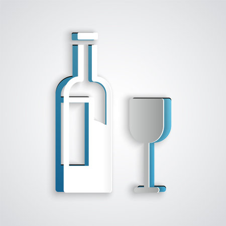 Paper cut Wine bottle with glass icon isolated on gray background. Paper art style. Vector.のイラスト素材