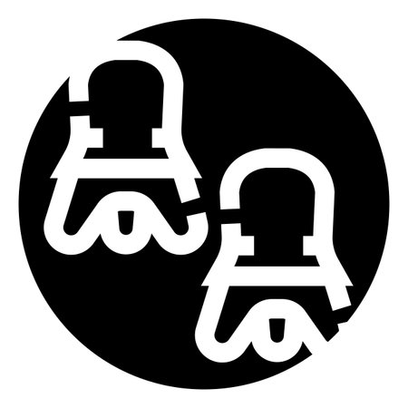 Pair of shuttlecocks in black circular iconのイラスト素材