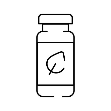 Natural medicine bottle with plant leaf iconのイラスト素材