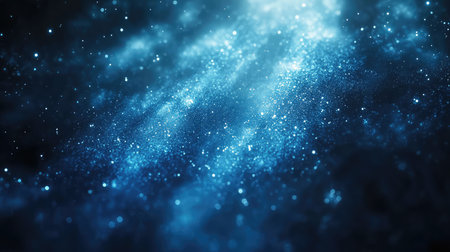 Glimmering blue sparkling particles creating mystical abstract backgroundの写真素材
