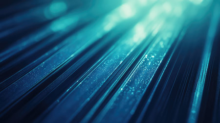 Glowing blue lines creating abstract technology background with data particlesの写真素材