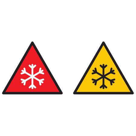 Red and yellow snow warning sign . Snowfall icon . Snowflake caution icon vectorのイラスト素材