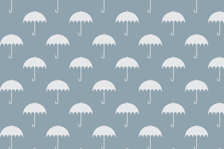 Umbrella pattern on winter background . Winter umbrella background . Vector illustrationのイラスト素材