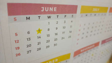 Yellow marked on a calendar concept for an important day or reminder.の写真素材