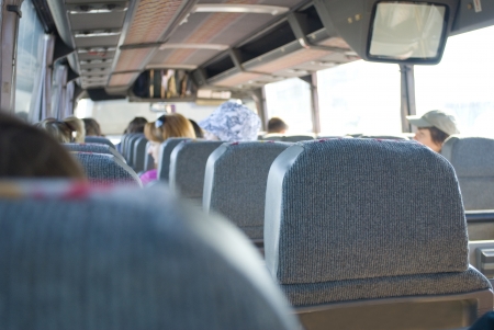 people travel in bus by travel agencyの写真素材