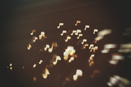 music, sound and notes abstract blur background (notes signs fly in space)の写真素材
