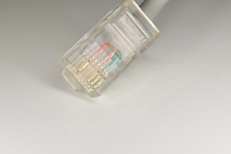 macro transparent rj45 with  4  pins on  ethernet wire (twisted pair)