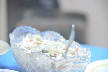 Russian salad in bowl (Olivie salad)の写真素材