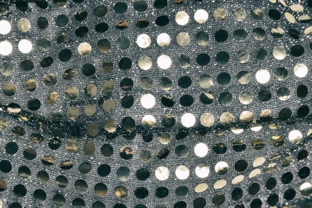 silver sequins on fabric (sewing costumes for dancing)の写真素材