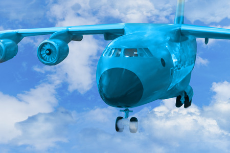 military cargo aircraft fly in clouda and  lands onの写真素材