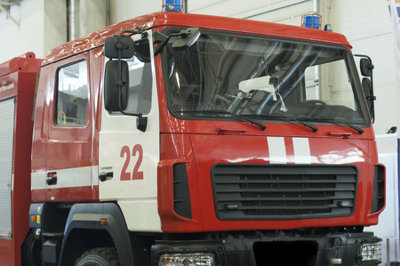 red fire engine vehicle with equipmentの写真素材