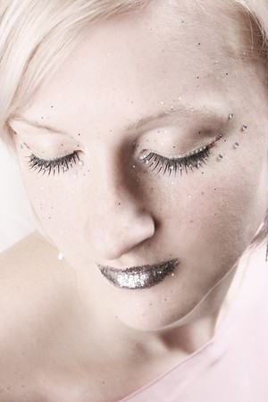 beautiful young woman with shiny make-upの写真素材