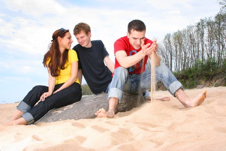 group of friends on the beachの写真素材