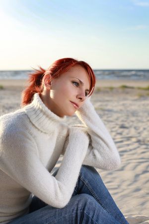 young woman relaxing at the beachの写真素材