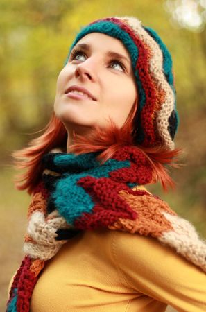 young girl walking in autumn parkの写真素材