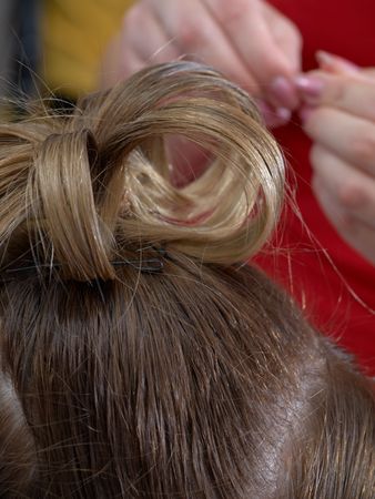 process of making evening woman coiffure, back viewの写真素材