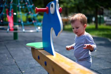 Portrait of sweet little boy on playground