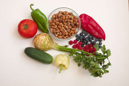 Directly above shot of the colorful vegetables on the white backgroundの写真素材