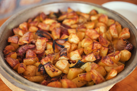 Closeup of baked potatoes with vegetablesの写真素材