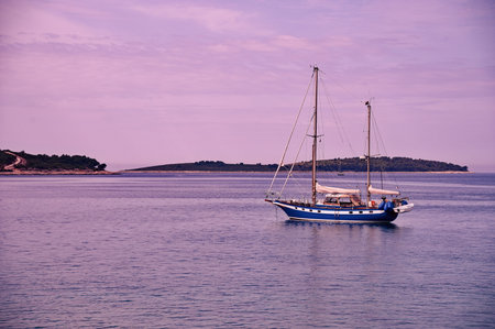Vintage wooden sailboat sailing in Adriatic seaの写真素材