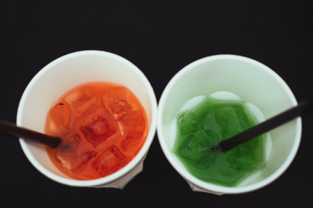 High angle view of colorful cocktails on black backgroundの写真素材