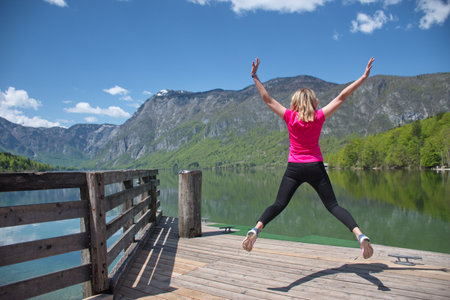 Portrait of the young woman having fun on the lake in Sloveniaの写真素材
