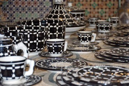 Closeup of black and white ceramic tea cupsの写真素材