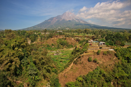 The view of Merapi volcano at Kedung Kayang Waterfall