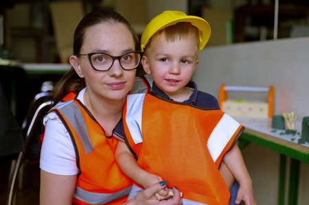 Portrait of mother playing with her toddlerの写真素材