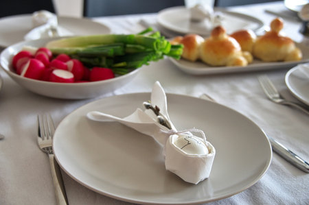 Decorated table served for Easter dinner