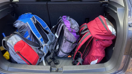 Backpacks in the trunk of the carの写真素材